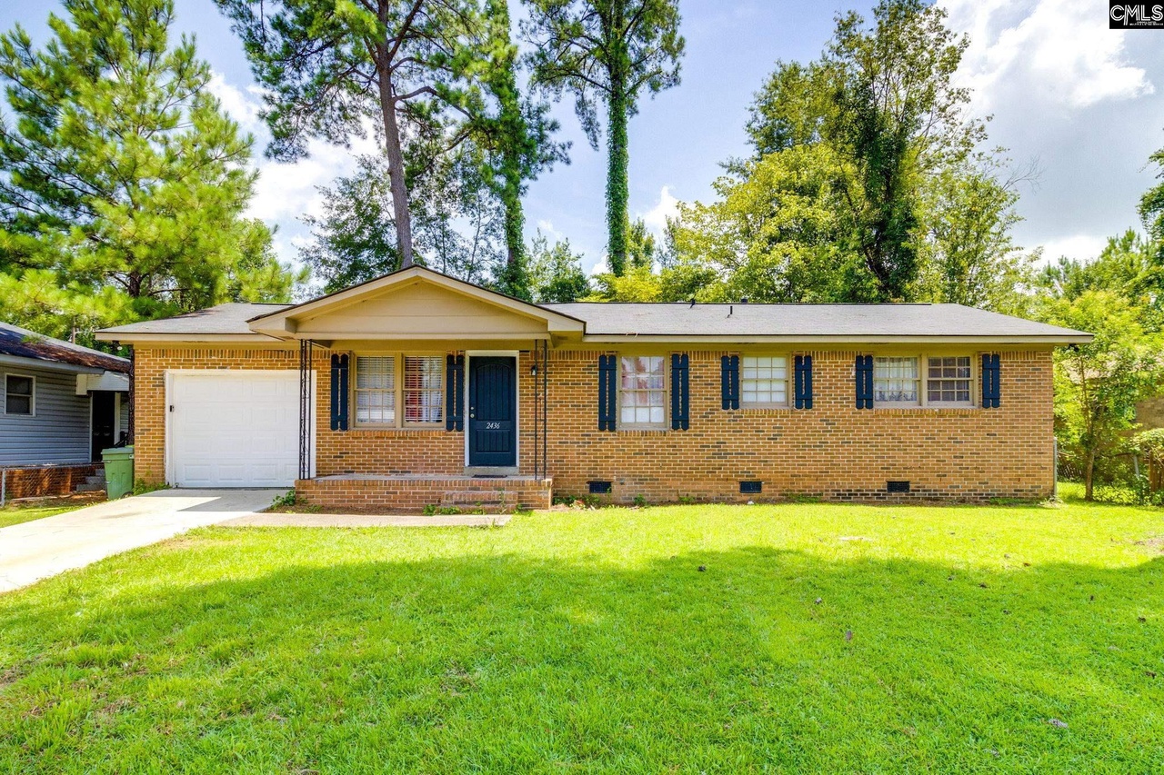  Delightful Brick Ranch-style Residence Situated at 2436 Windy Drive.