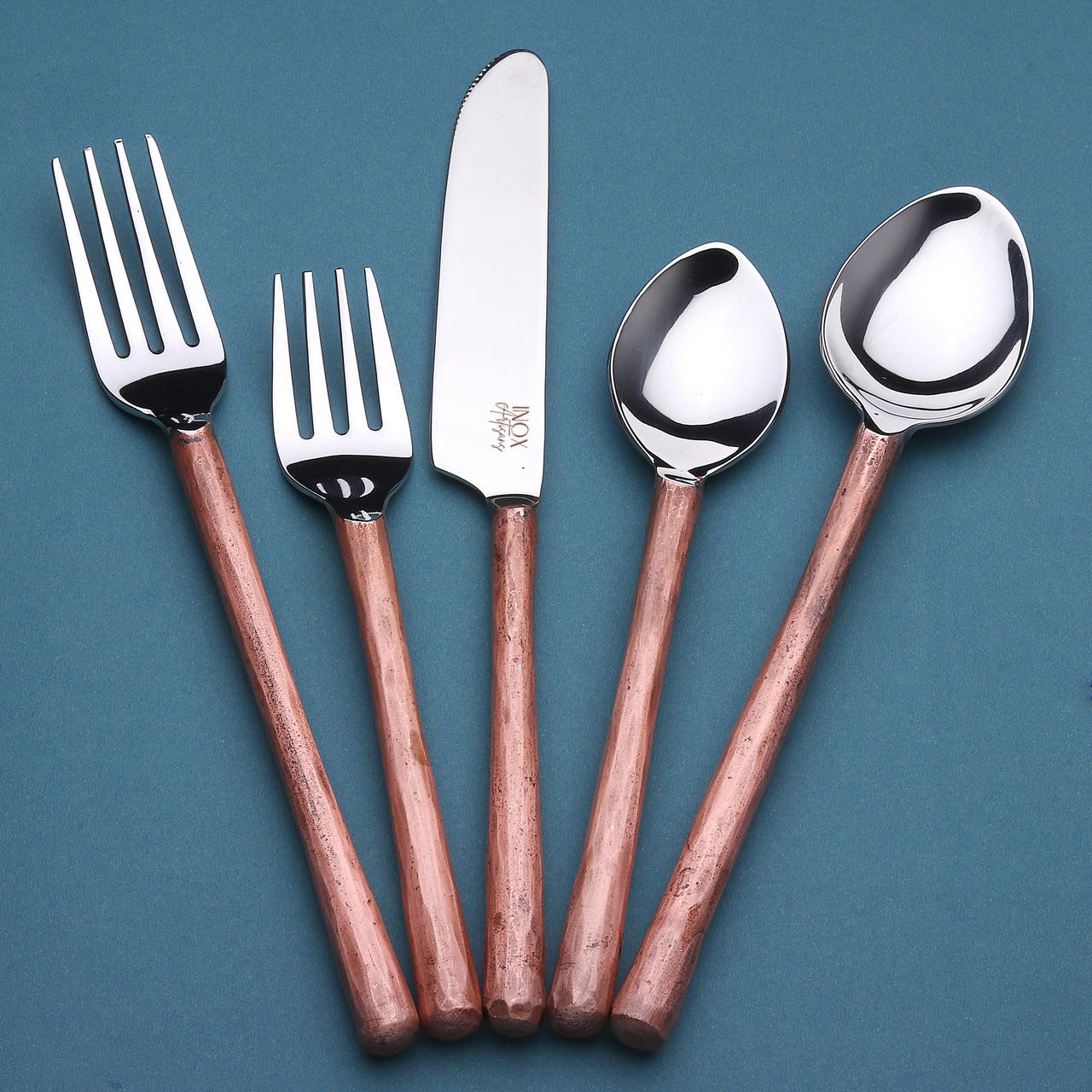  Copper flatware is the perfect choice for a classic table setting.